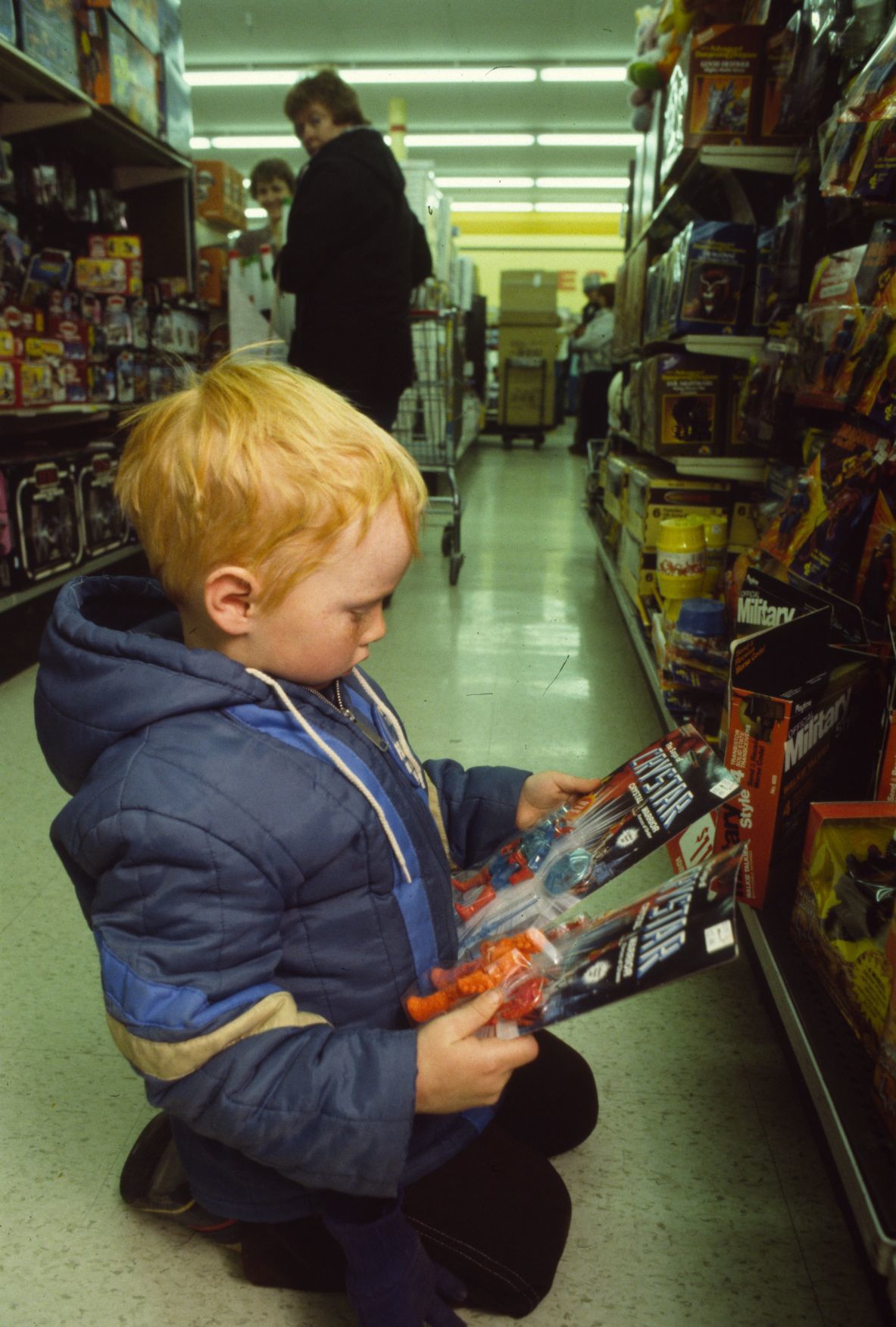 Toy shopping at K-Mart, December, 1983